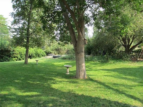 Large fenced mature back yard
