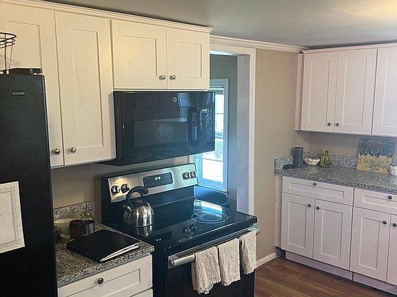 Tons of space and storage in this large kitchen. Hardwood floors are in every room.