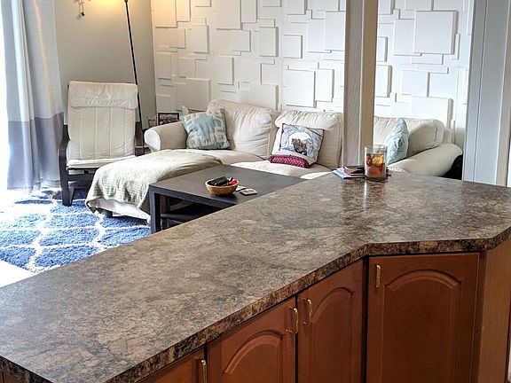 Other side of the living area and island kitchen