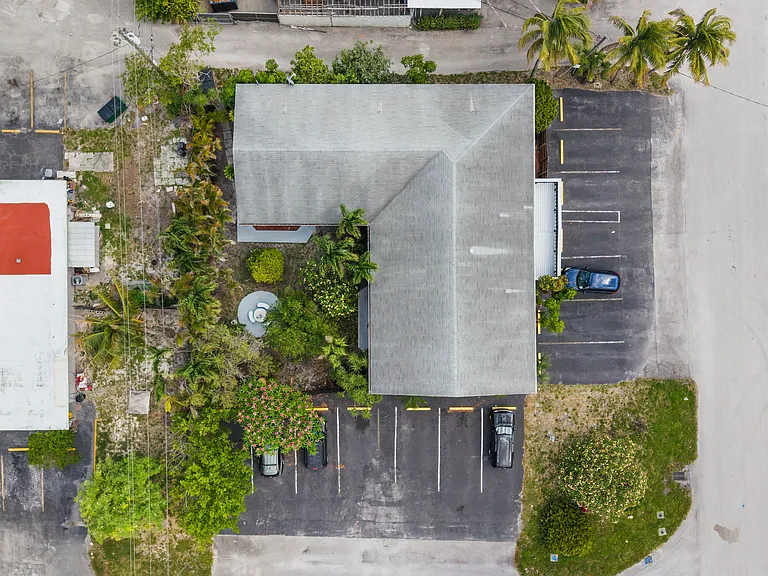 aerial of building, 2 parking spots