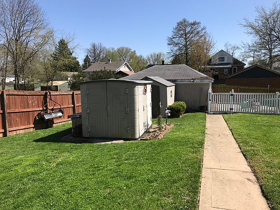Two of three plastic sheds 