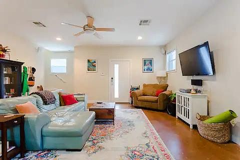 Living room area facing the front door.