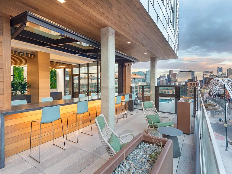 Outdoor lounge with dining areas and gorgeous views of Denver.