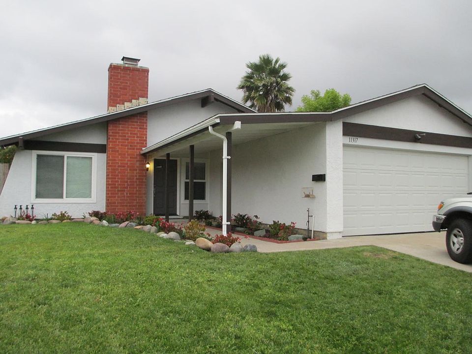 Front of house, two car garage