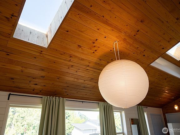 More light and playful knotty wood provide a wonderfully unique interior ambiance.>