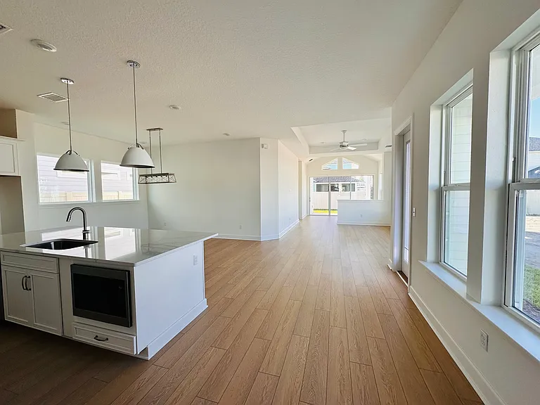 kitchen island to dining area and living room