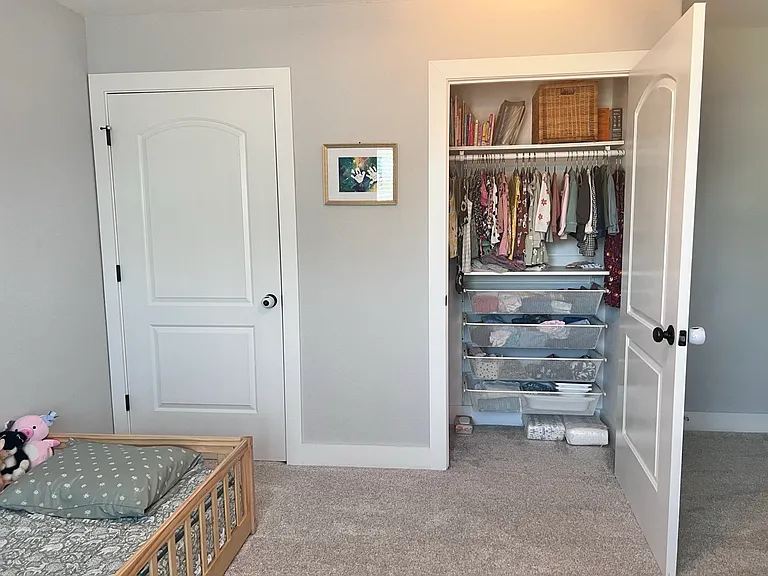 Large double closets with organizers in the right closet