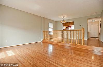 Living Room is large w/ solid oak flooring
