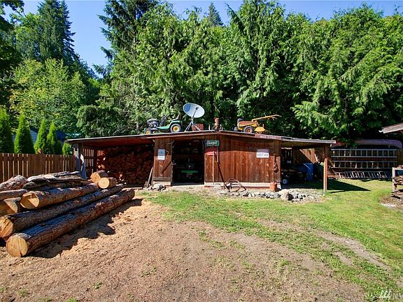 wood and tool shed with plenty of room to store all your landscaping equipment. 