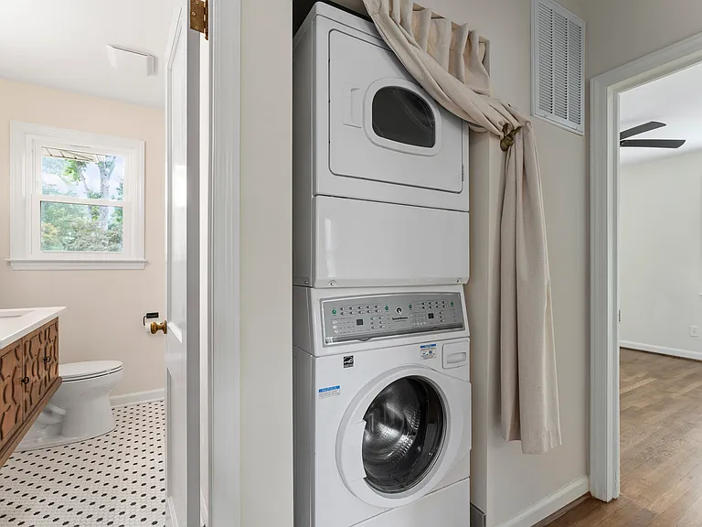 Laundry features professional grade speed queen washer and dryer.
