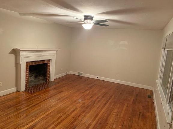 Living room. Hardwood floors throughout. Hunter ceiling fan with dimming feature. Storage closet at front door entry and hallway as well as pantry in dining area. Plenty of storage