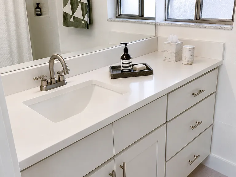 Upstairs bathrooms in the lofts have windows and soft-close cabinets.