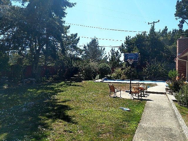 Huge grass yard, Solar heated pool, Cement Deck 