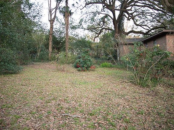 Fenced-in back yard.