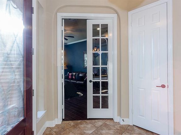 Double French doors (great for noise control) lead to the Study/Music room/Man Cave....you decide.