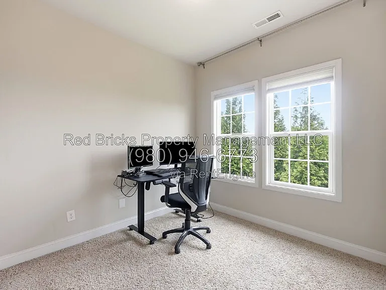 9659 Camberley Ave NW — Photo 37