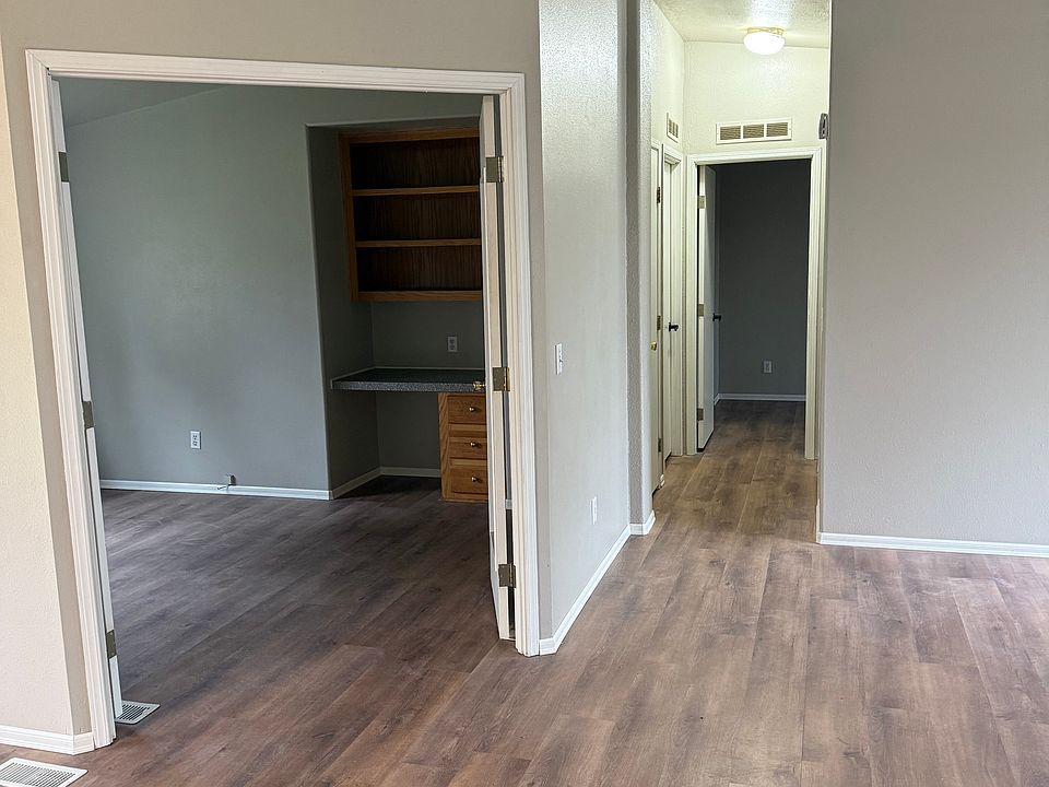 At Kitchen, looking towards den and 2 bedrooms and bathroom.