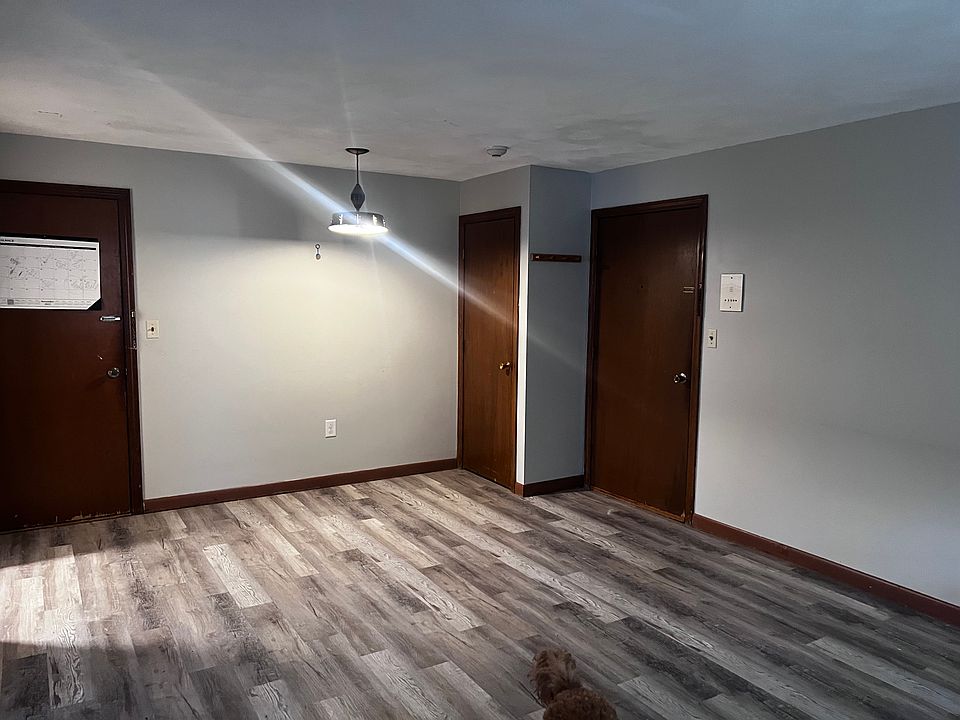 Front room combo dining and living room 19' x 12.6'. Two doors to exit the unit and a closet. There is also a large private storage area outside of the door to the right.