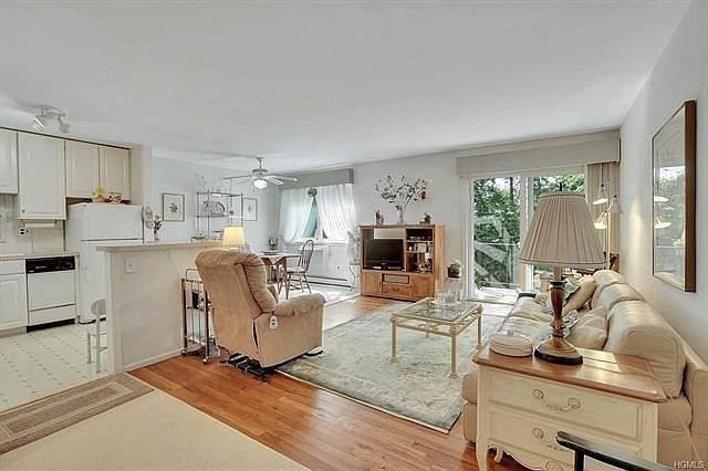 Enter into this sun filled home with spacious open floor plan.