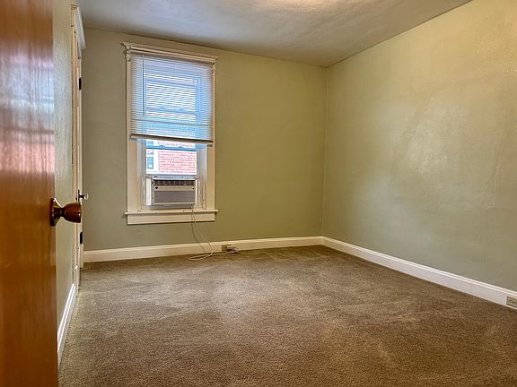 Bedroom 1. 2 window a/c units provided.