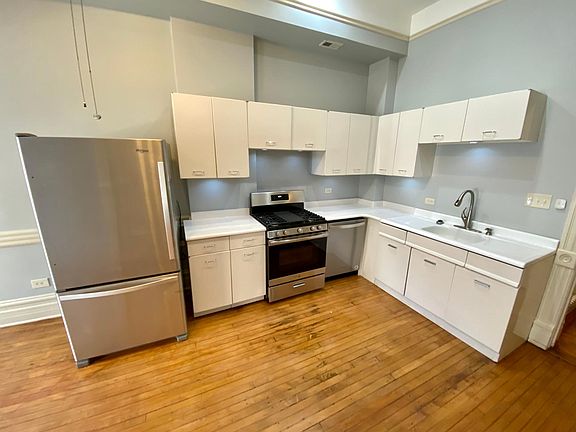 newer stainless steel appliances and newer silestone counter top