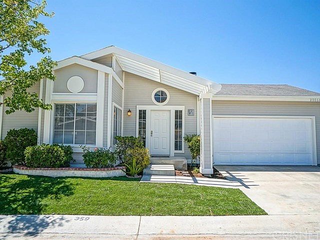 Amazing curb appeal with new sod and fresh paint
