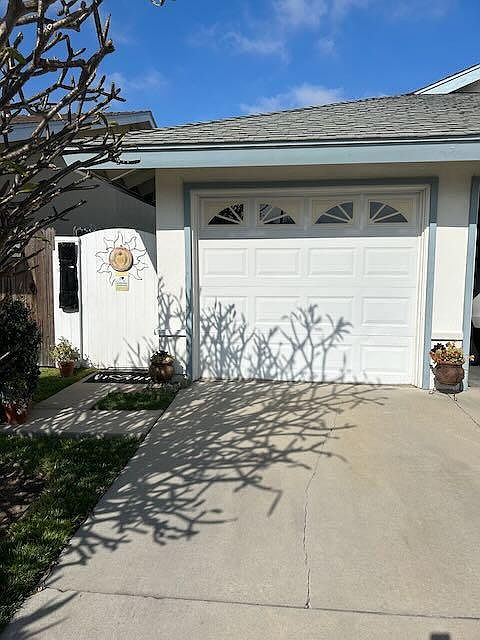 Your garage with opener, Entry to home on Left