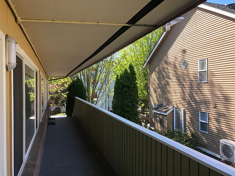 Outside front door - walkway to East