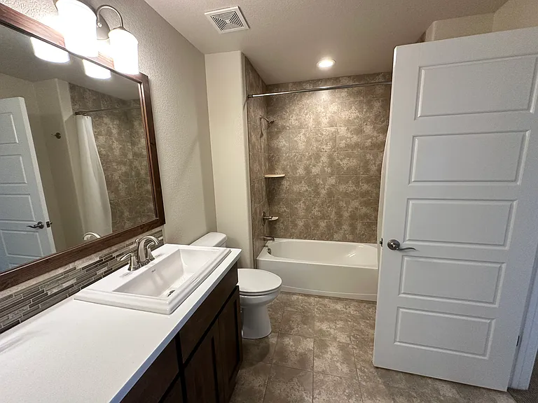 Master bath with double sink.