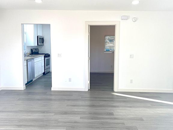 Living Room Looking into kitchen and bedroom