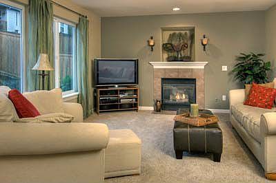 Gas fireplace and picture windows in family room