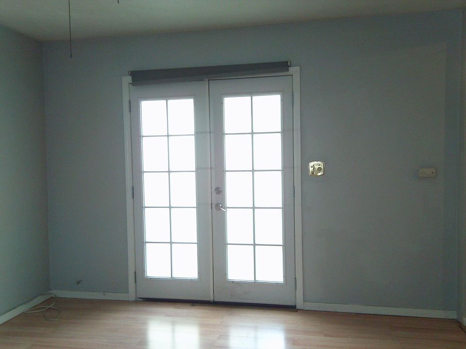 Patio door to outside and common area