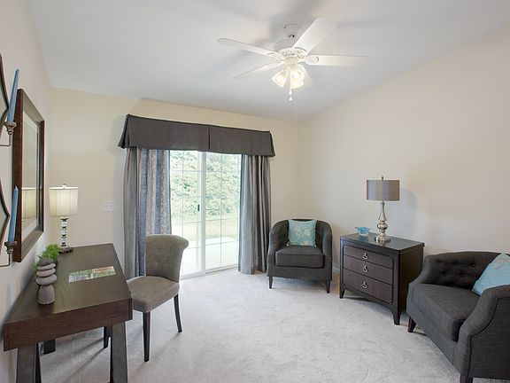 Flexible den space makes a perfect office, sitting room, lib