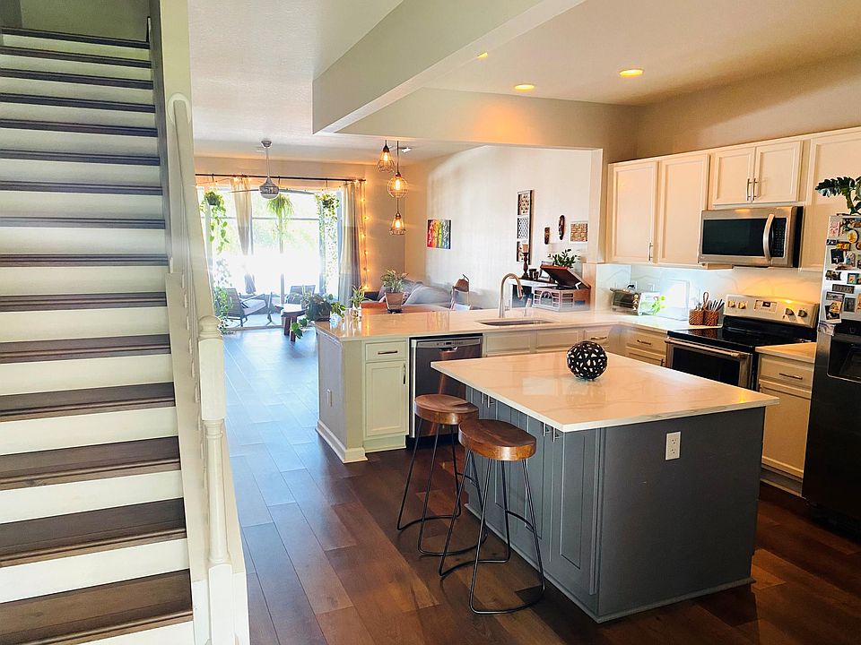 Open kitchen and stairway to second floor.