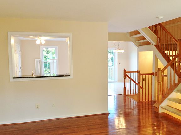 View from LR to dining rm, kitchen, deck & 2nd floor