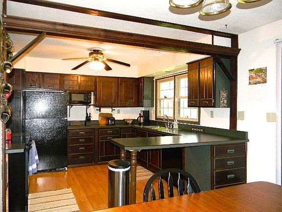 Updated Laminate wood flooring in Kitchen.