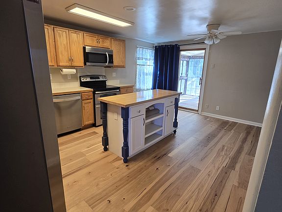 Kitchen, Sliding Glass Door, Stairs to Lower Level