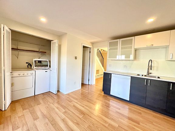 Kitchen. Washer/ Dryer. Half Bathroom.