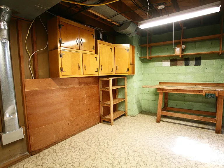 Storage room including workbench