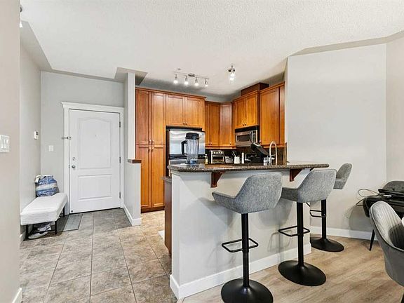 4th image of 10 S Discovery Ridge Close SW #211