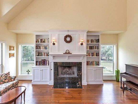 Open Great Room w/Builtins & Fireplace