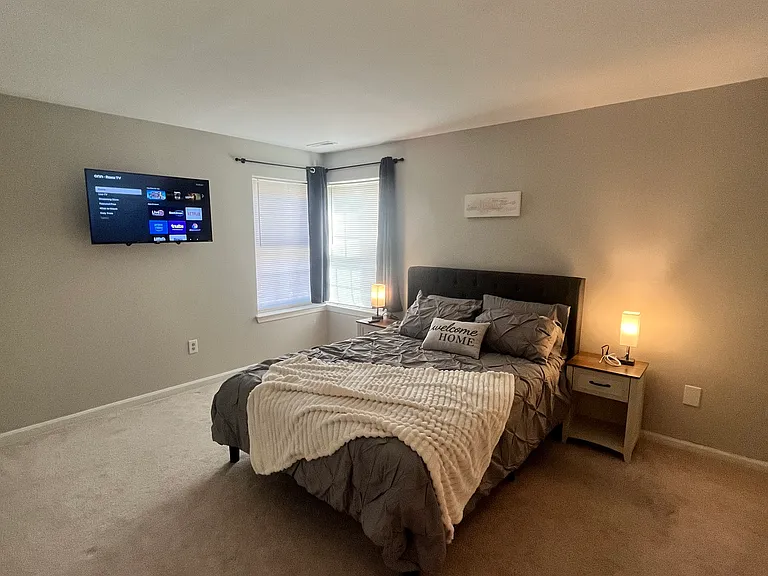 main bedroom with Roku Smart TV