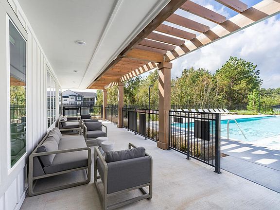 Our poolside seating offers the perfect spot to relax, recharge, and enjoy the serene atmosphere.