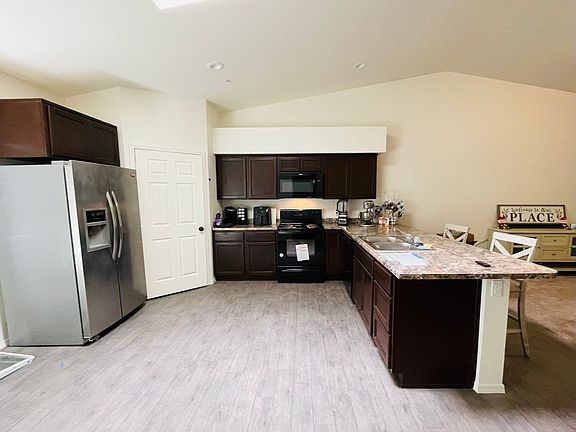 4th image of 7273 E 37th Pl