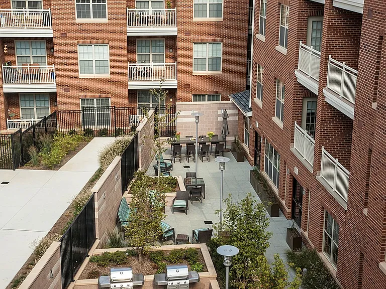 Urban Courtyard With BBQ & Seating Areas