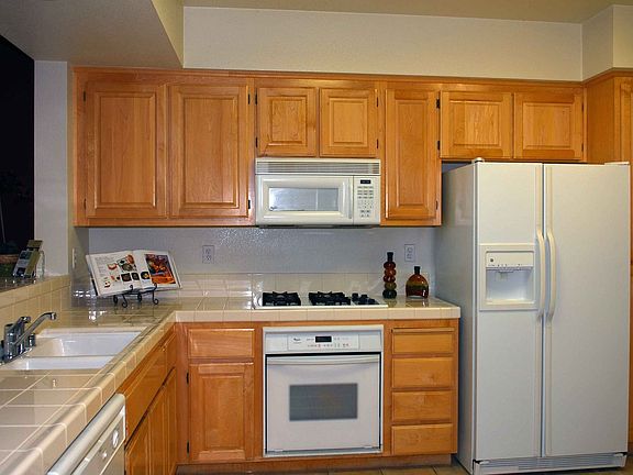 The Kitchen is arranged in the classic triangle valued by serious cooks
