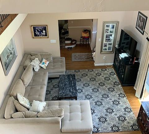 Living room from top of open stairs to loft.jpeg