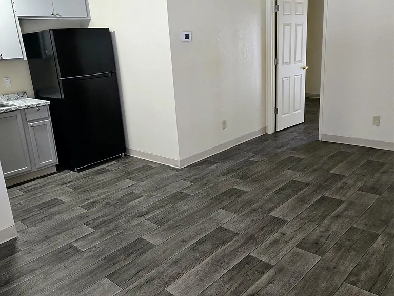 Open floor plan with new vinyl throughout