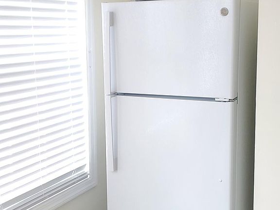 Included in the room is a 17 cubic ft brand new GE refrigerator and brand new RCA microwave.