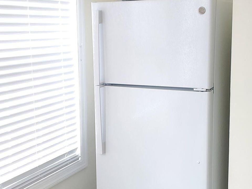 Included in the room is a 17 cubic ft brand new GE refrigerator and brand new RCA microwave.